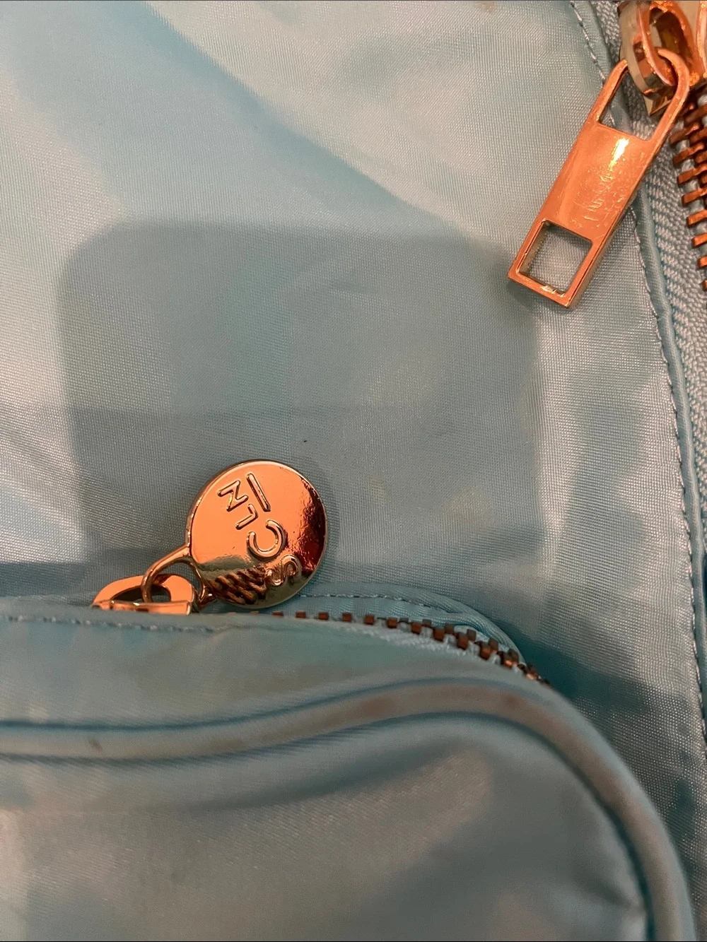 Stoney Clover Lane Light Blue Backpack with Pink Logo Tag